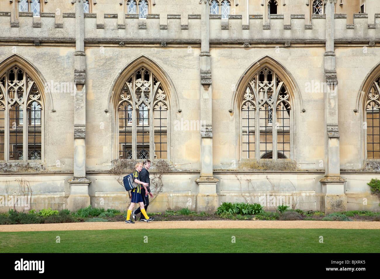 Two students returning to their rooms, New Court, St Johns College, Cambridge university, Cambridge, UK Stock Photo