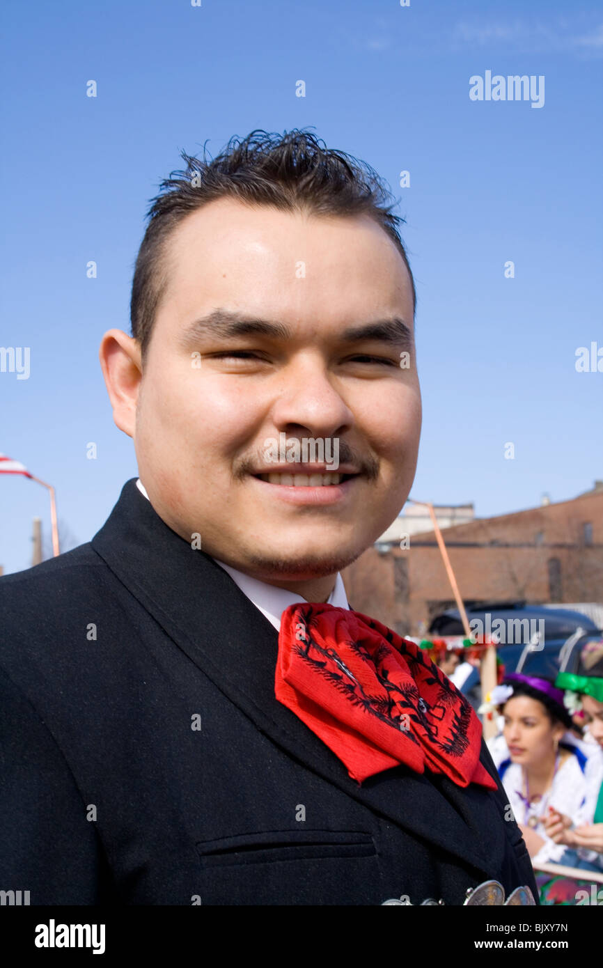 Ruggedly handsome Hispanic man wearing traditional holiday Mexican attire. Cinco de Mayo Fiesta St Paul Minnesota USA Stock Photo