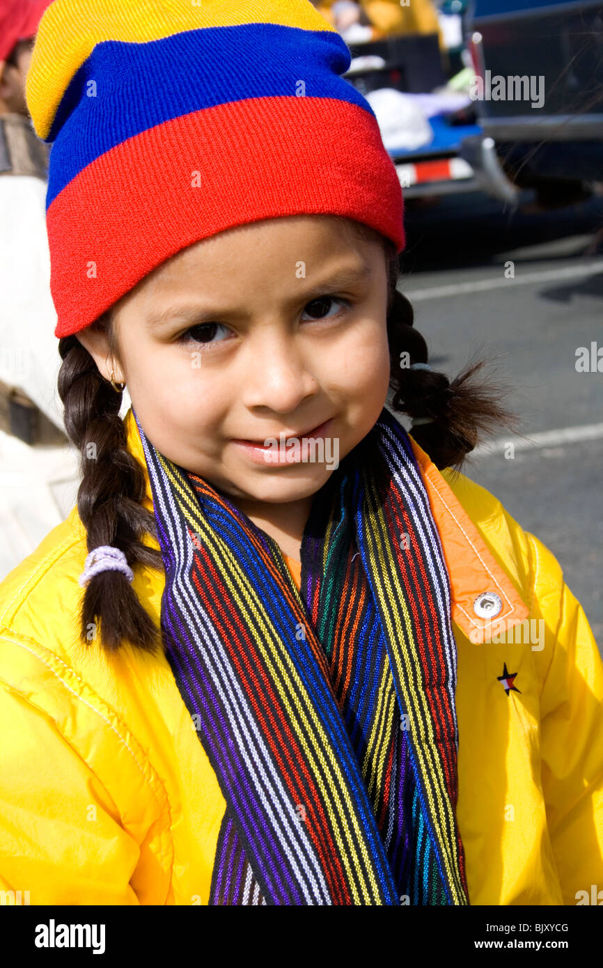 Hispanic youngster age 4 wearing her festival colors. Cinco de Mayo Fiesta St Paul Minnesota USA Stock Photo
