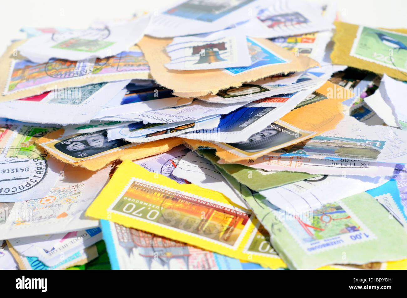 Assortment of used postage stamps Stock Photo