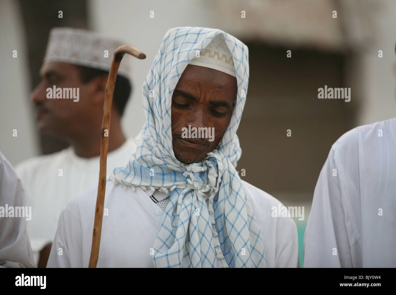 Man outside Riyadha Mosque Lamu Kenya during the maulidi celebration of Prophet Mohammed's birthday Stock Photo