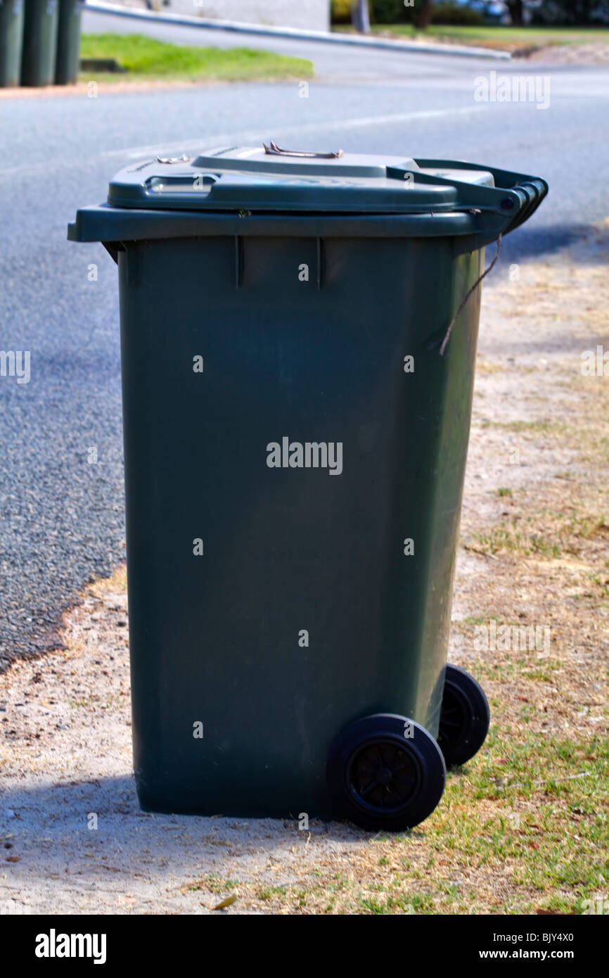 Wheelie bin waiting for collection Stock Photo