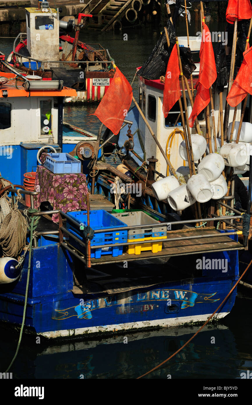 SCARBOROUGH, NORTH YORKSHIRE, UK - MARCH 19, 2010:  Closeup of small fishing boats in the harbour Stock Photo