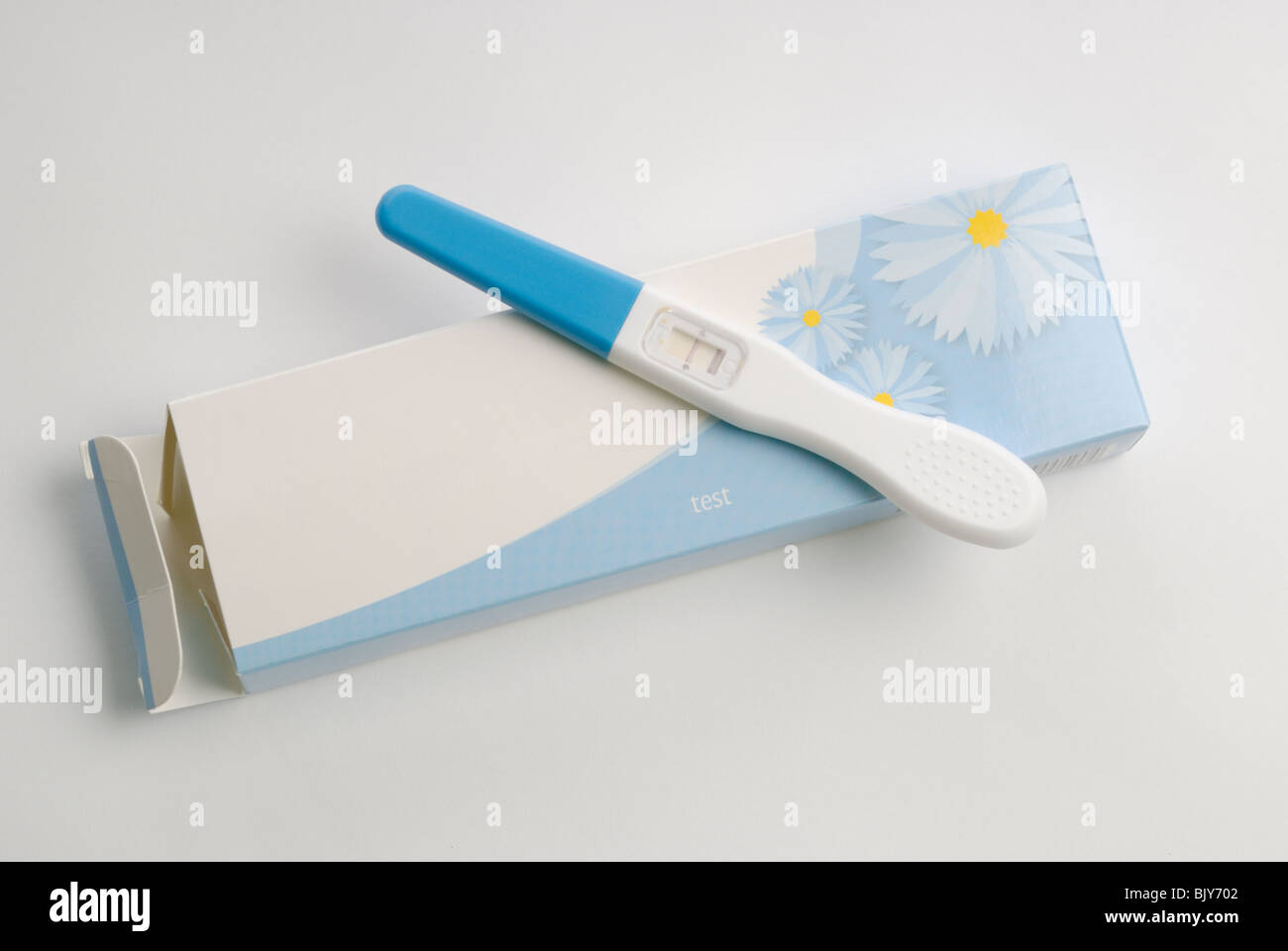 Pregnancy test showing a positive result Stock Photo