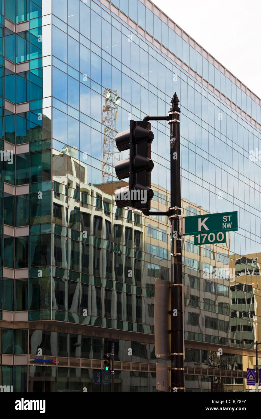Washington DC, K Street sign, stop light and glass building Stock Photo