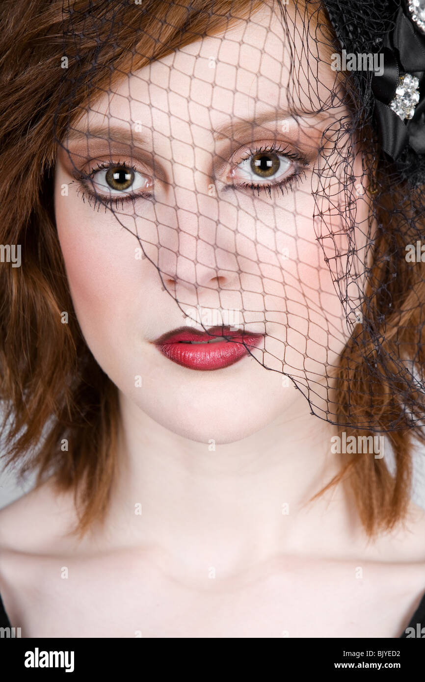 Close Up Portrait of a Pretty Teenage Girl in Veil Stock Photo