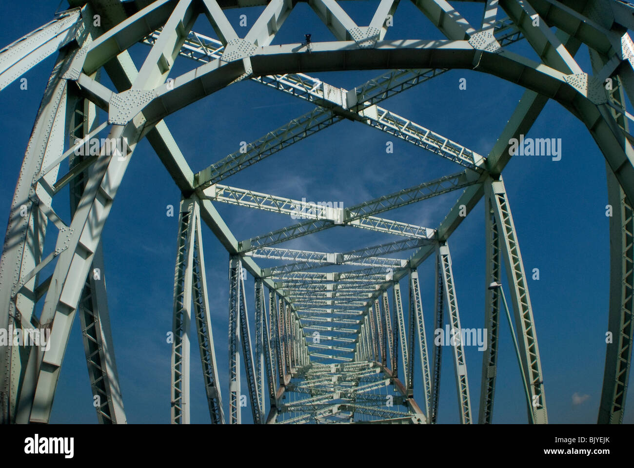 The steel girders in a cobweb shape for the single arch Runcorn Bridge Stock Photo