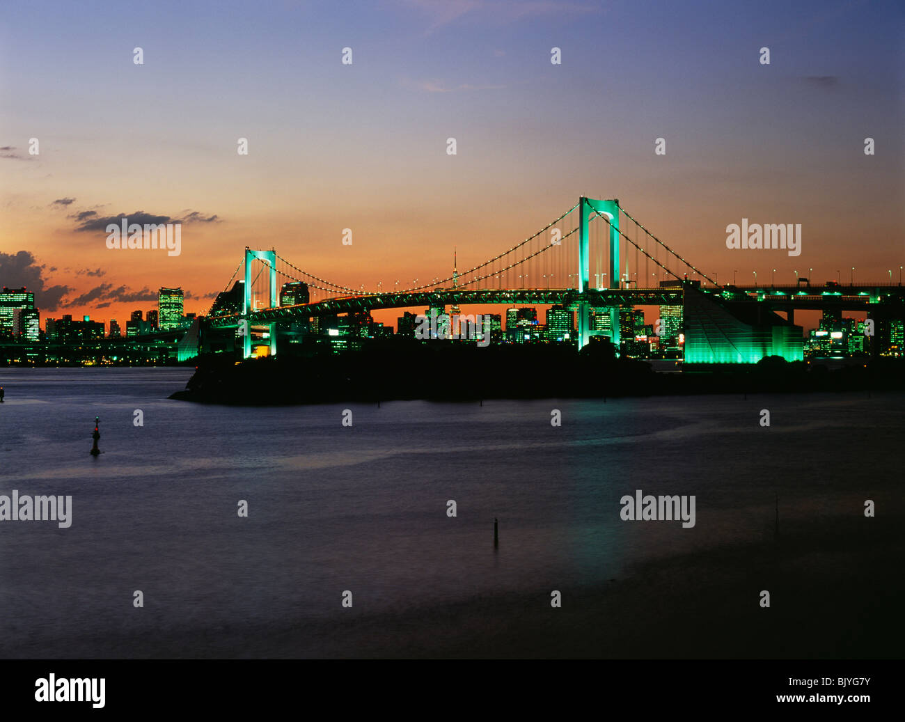 Illuminated rainbow bridge in Tokyo, Japan Stock Photo - Alamy
