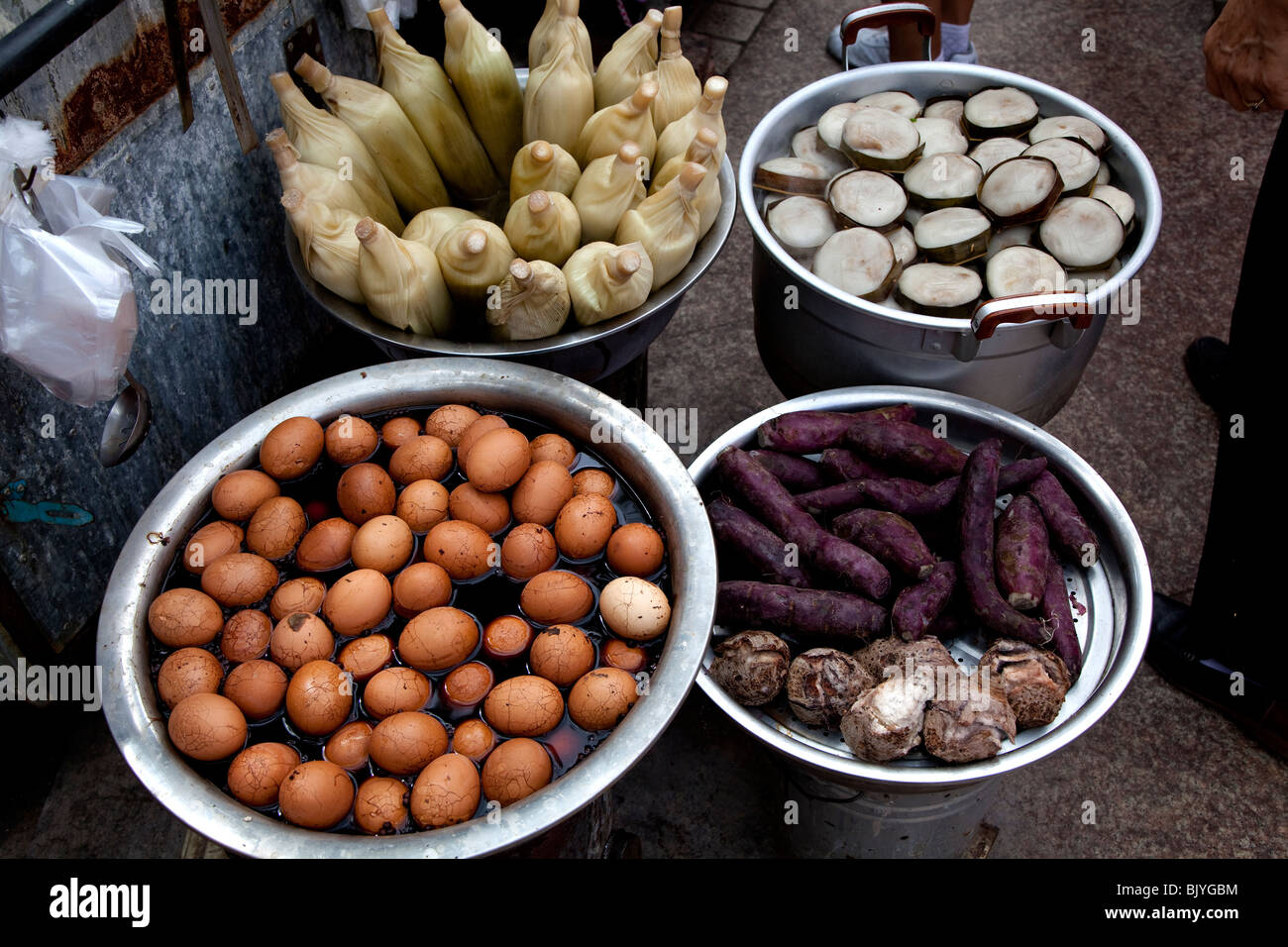 Chinese food on sale at a stall in Sanya, Hainan Island, China. Stock Photo