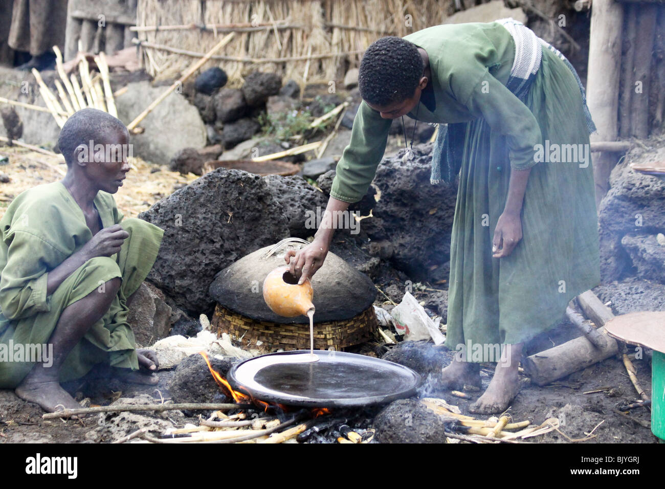 Africa, Ethiopia, Lalibela, Woman cooking Injera (pancake like bread