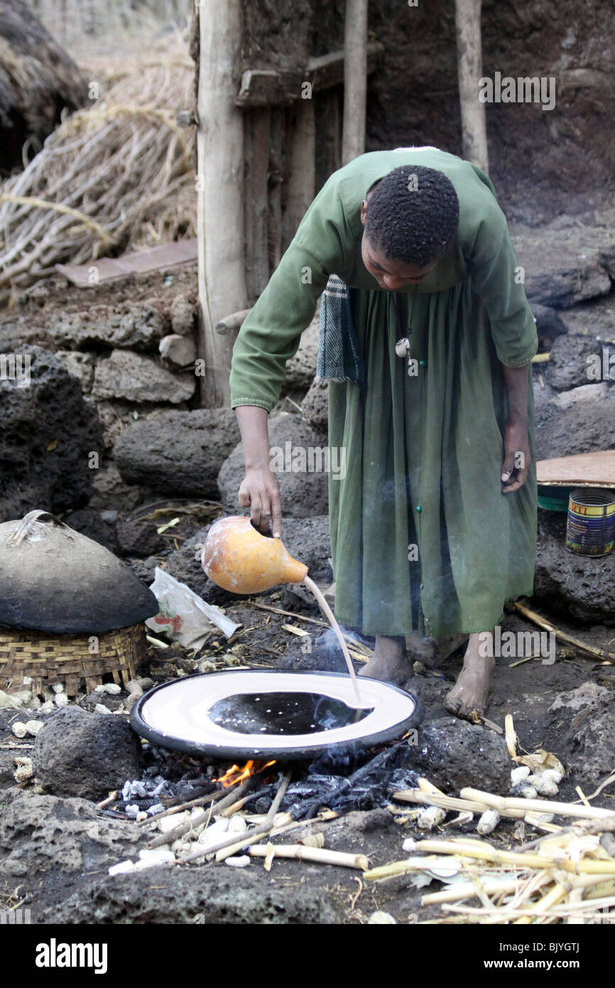 Africa, Ethiopia, Lalibela, Woman cooking Injera (pancake like bread