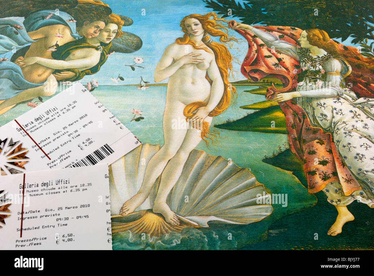 Two entrance tickets to Florence's most famous gallery, the Galleria degli Uffizi. On the background is La Nascita di Venere,... Stock Photo