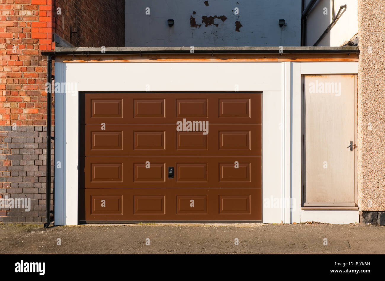 Brown garage door Stock Photo Alamy