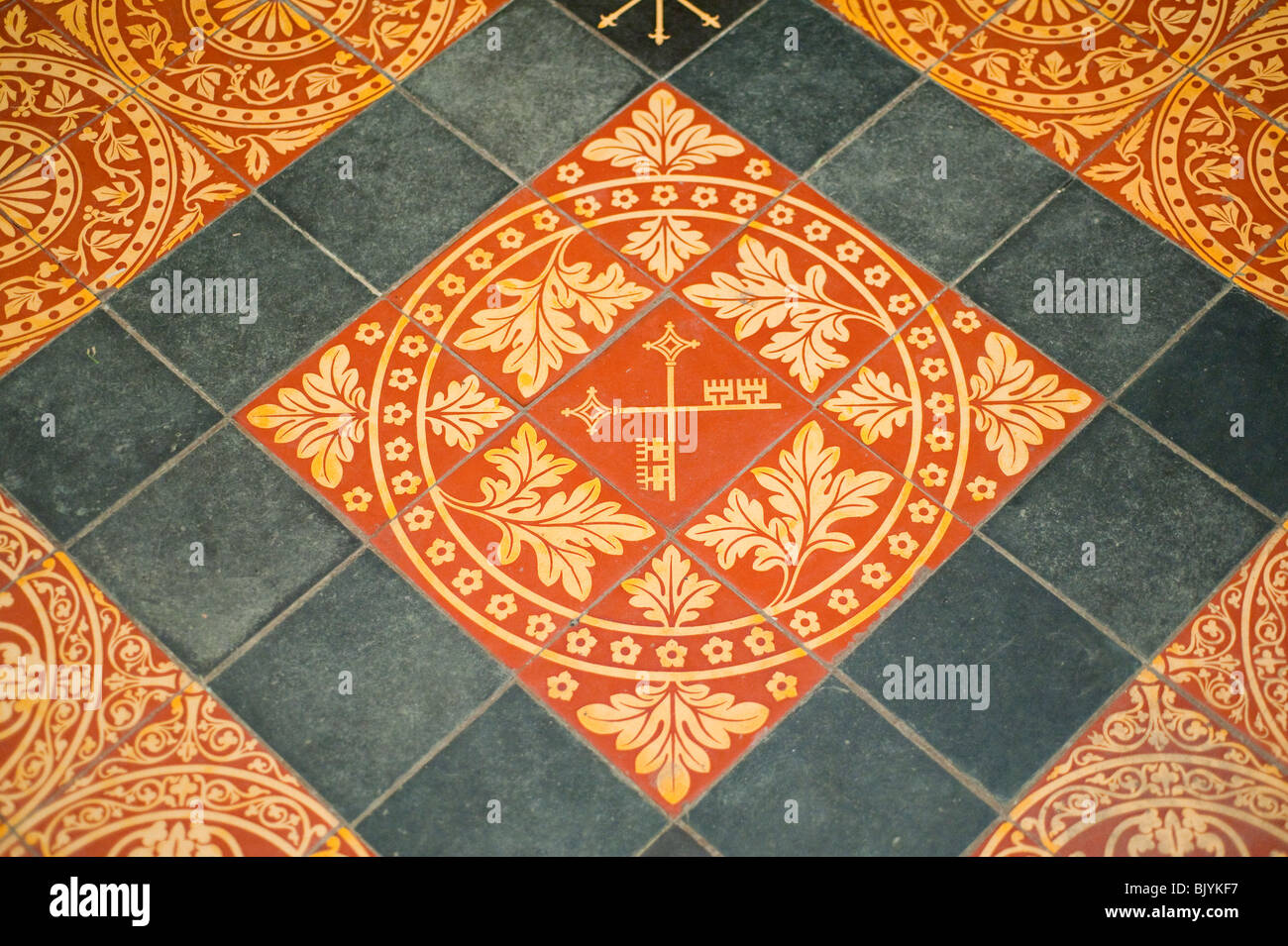 Cross keys pattern on floor tiles York UK Stock Photo