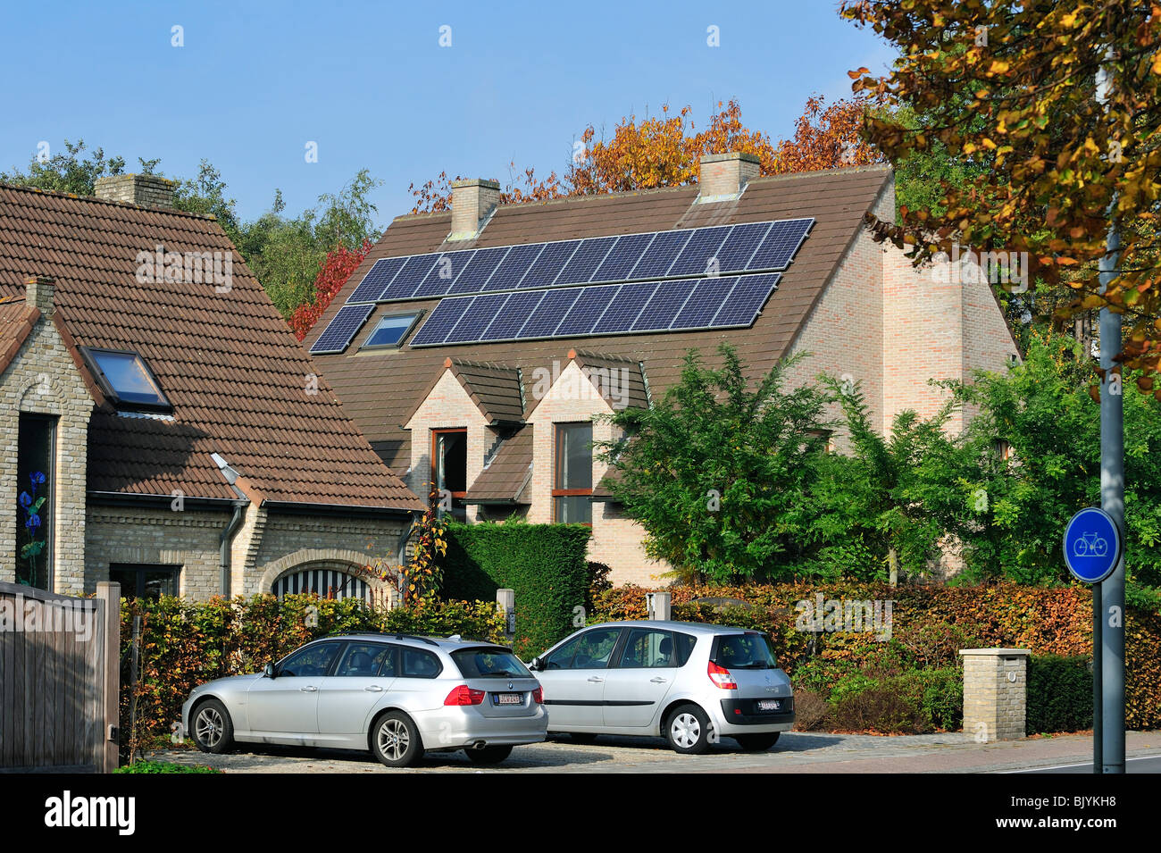 Photovoltaic solar panels on roof of house Stock Photo
