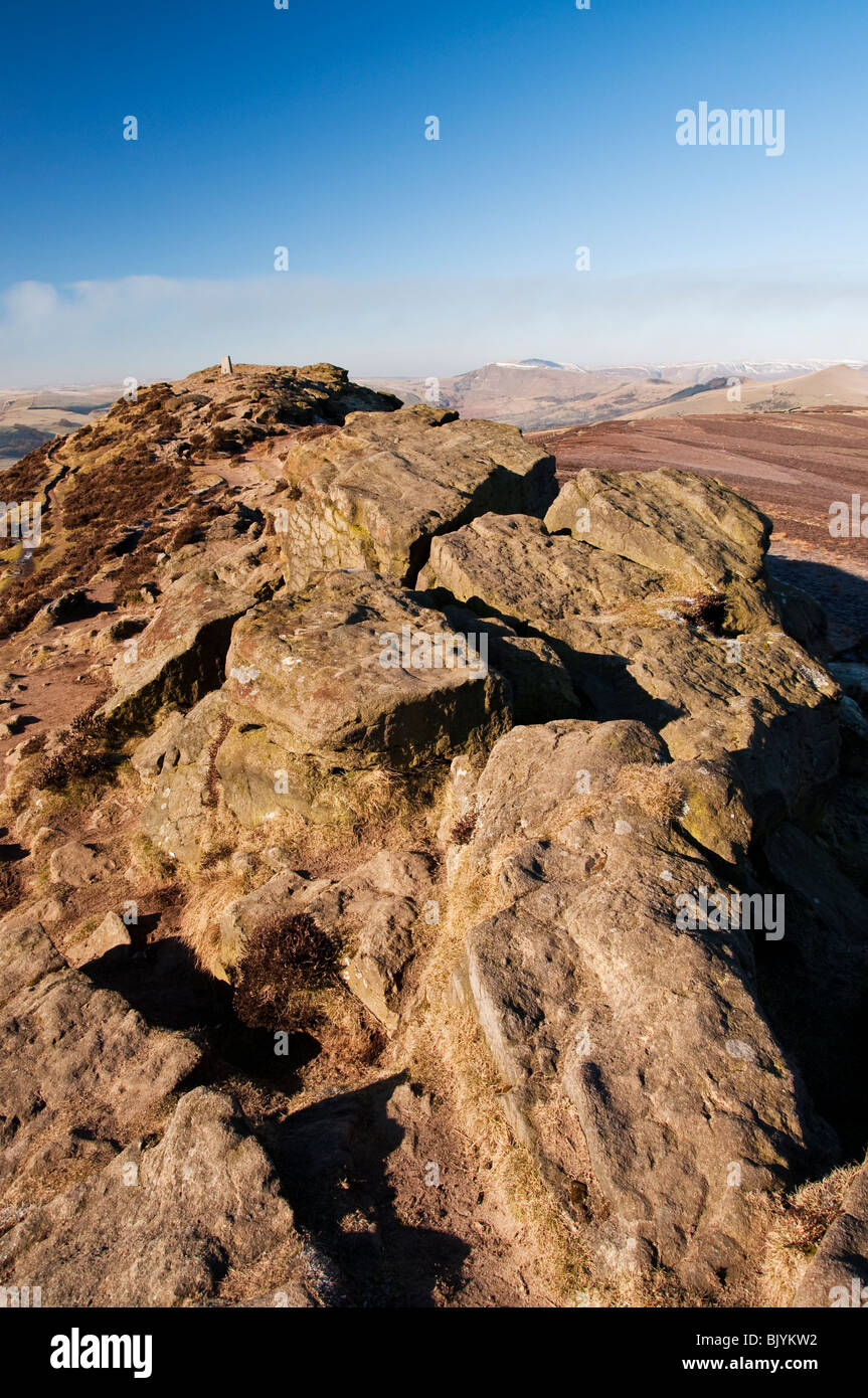 The narrow ridge that runs along Win Hill, seen here in bright winter sunshine Stock Photo