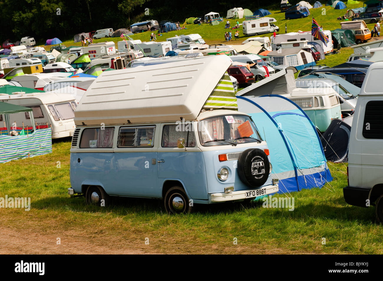 pale blue Volkswagen campervan at festival Stock Photo