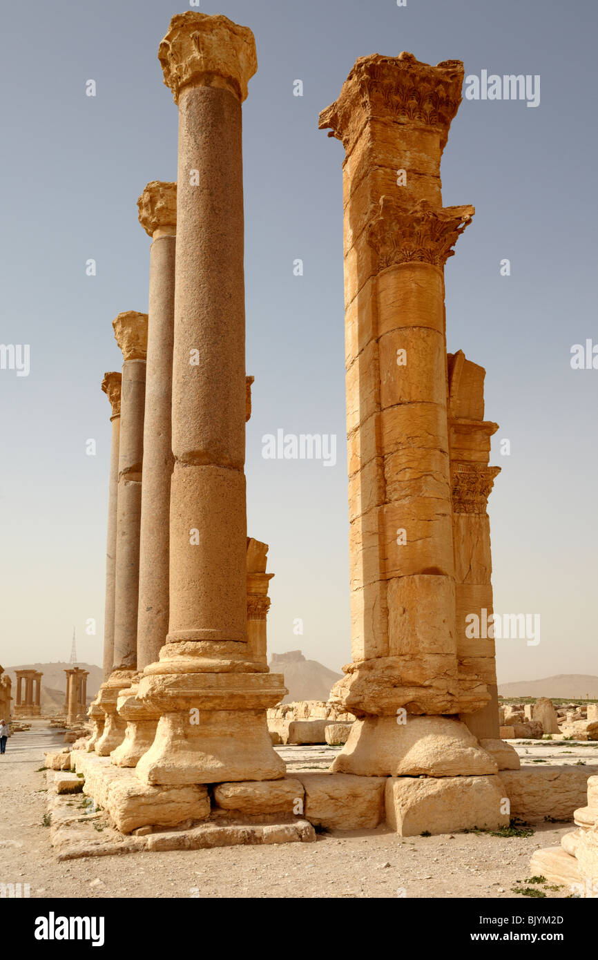 Palmyra Syria grand colonnade and arab hill fort Stock Photo
