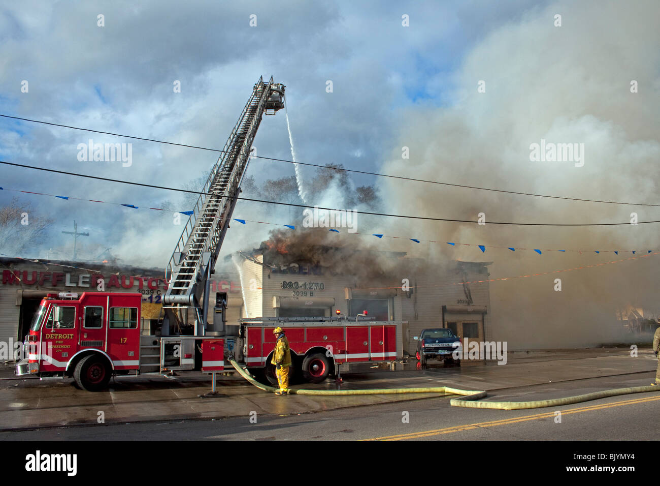 Aerial Platform operating at 2nd Alarm Fire Detroit Michigan USA by Dembinsky Photo Assoc Stock Photo