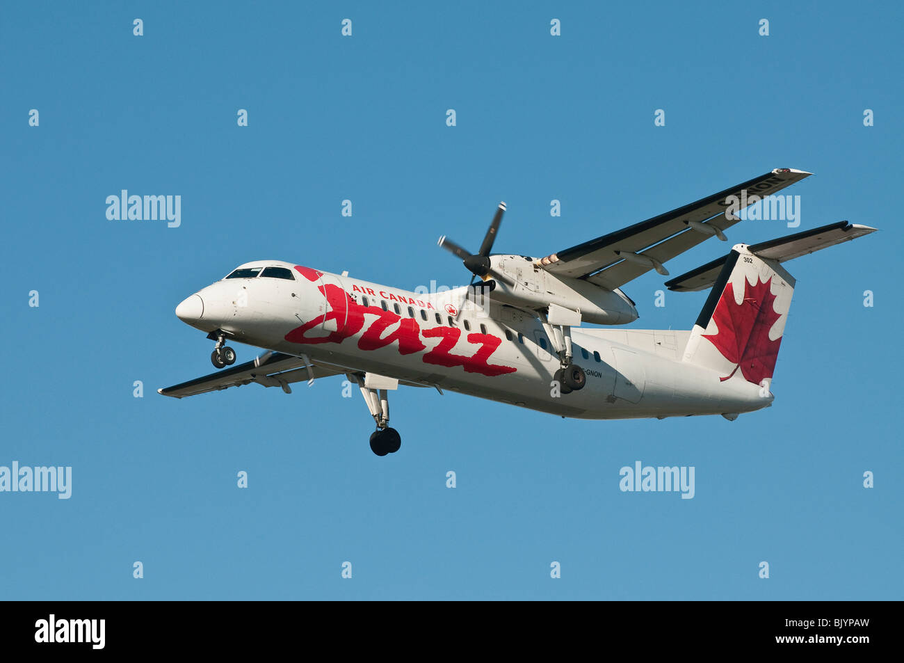 Air Canada Jazz Dash 8 on final approach for landing. Stock Photo