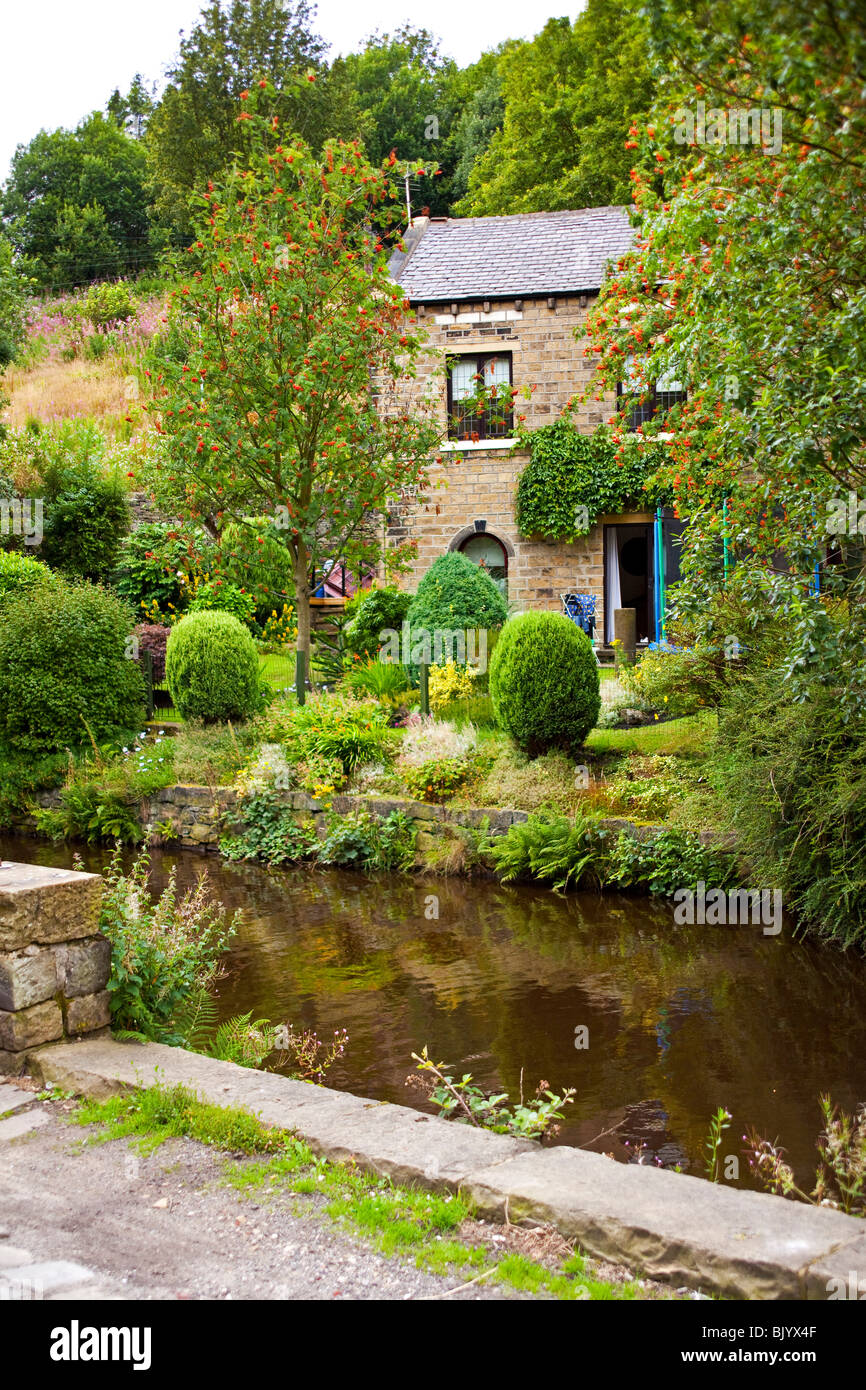 a cottage at the side of the Huddersfield narrow canal Slaithwaite West