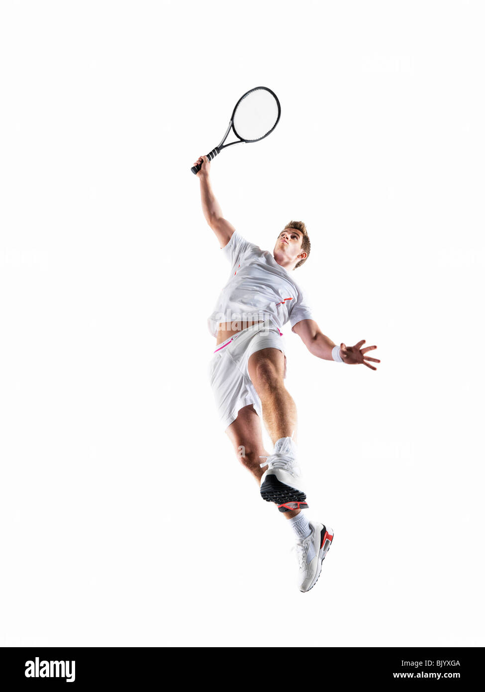 Man playing tennis Stock Photo