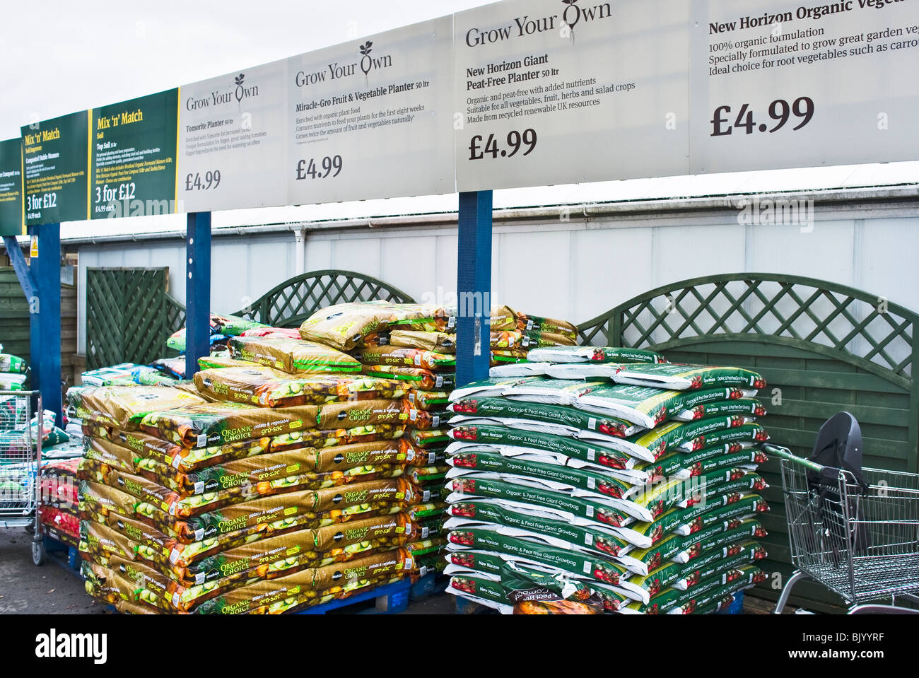 Bags of compost for sale at a garden centre in Wiltshire England UK EU