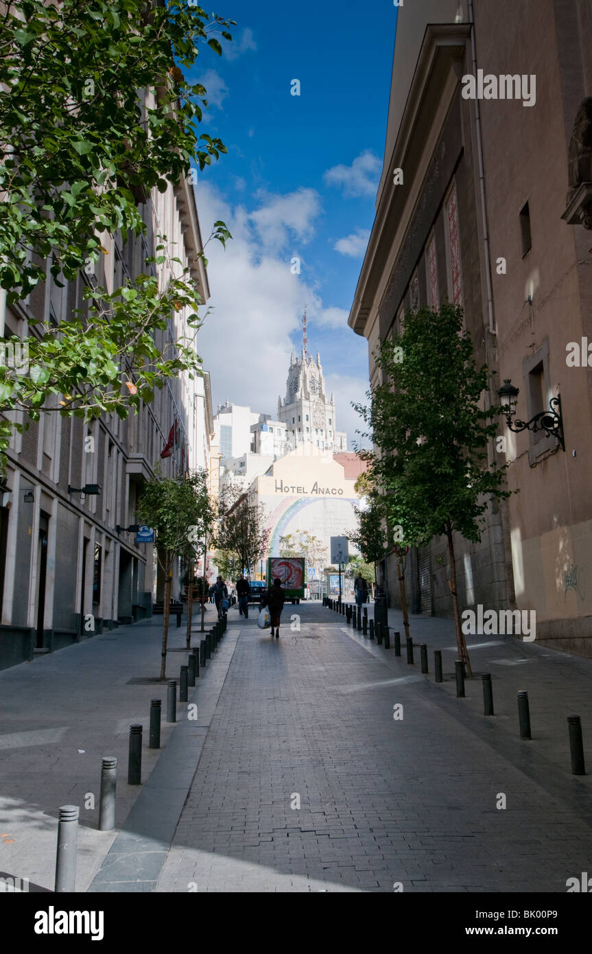 narrow street in the city center with Edificio Telefonica in the background Stock Photo