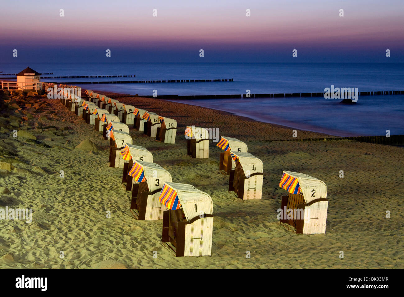 Beach chairs in the evening at the beach of Kuehlungsborn, Germany, Baltic Sea, Mecklenburg-Western Pomerania. Stock Photo