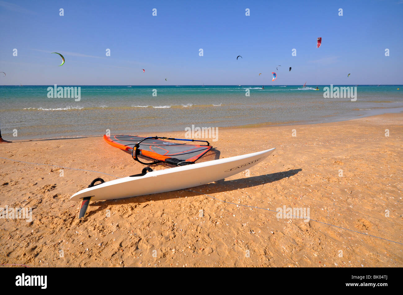 Windsurfing board and sail on the beach Stock Photo - Alamy