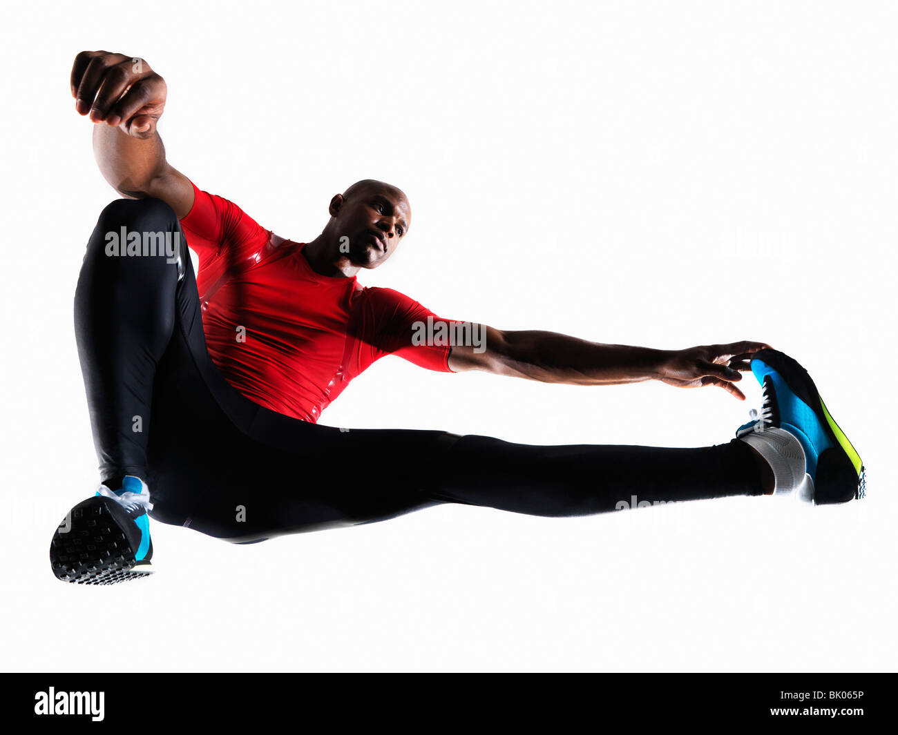 Male athlete stretching Stock Photo