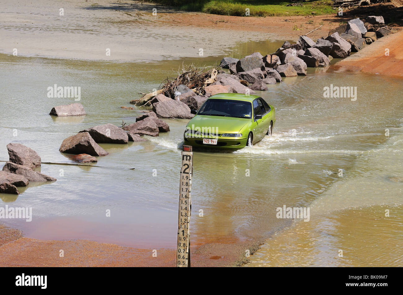 Car fording East Alligator River Crossing (Cahills Crossing) Kakadu