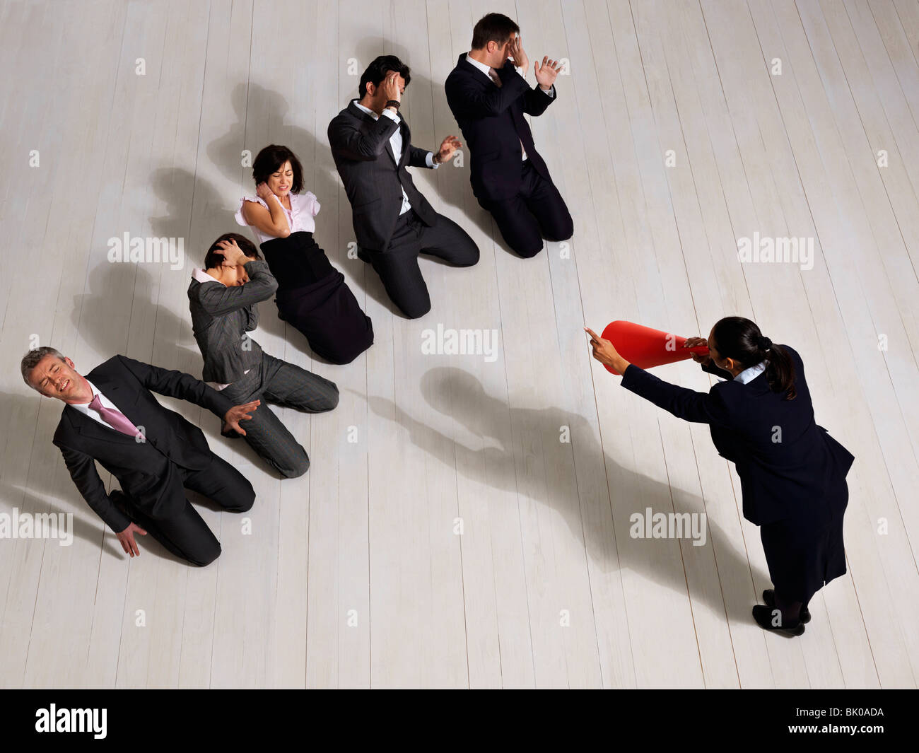 Business man in suit kneeling hi-res stock photography and images - Alamy