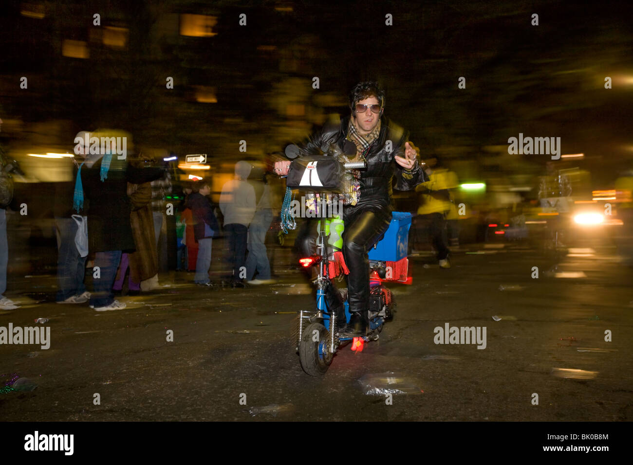 Elvis impersonators on scooters, part of Muses, one of many parades in Mardi Gras, New Orleans, Louisiana Stock Photo