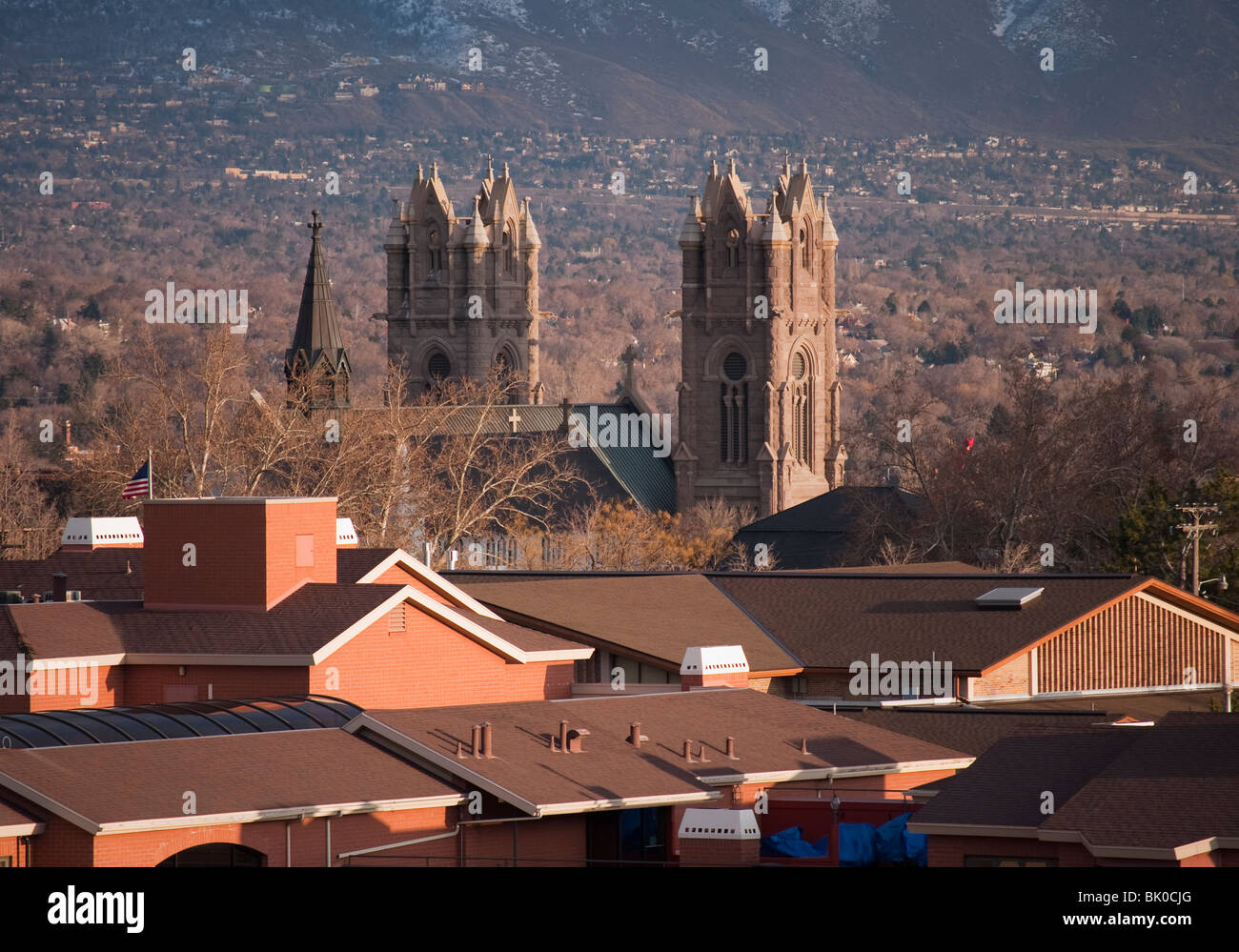 View of the Cathedral of the Madeleine from an overlook of Salt Lake foothills near the Utah Capitol building Stock Photo