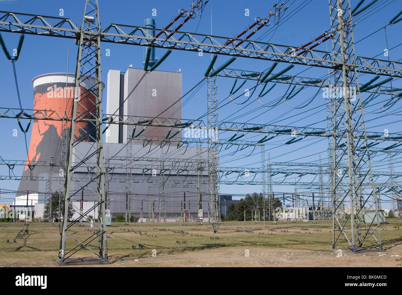 Power plant with power pole and blue sky Stock Photo - Alamy
