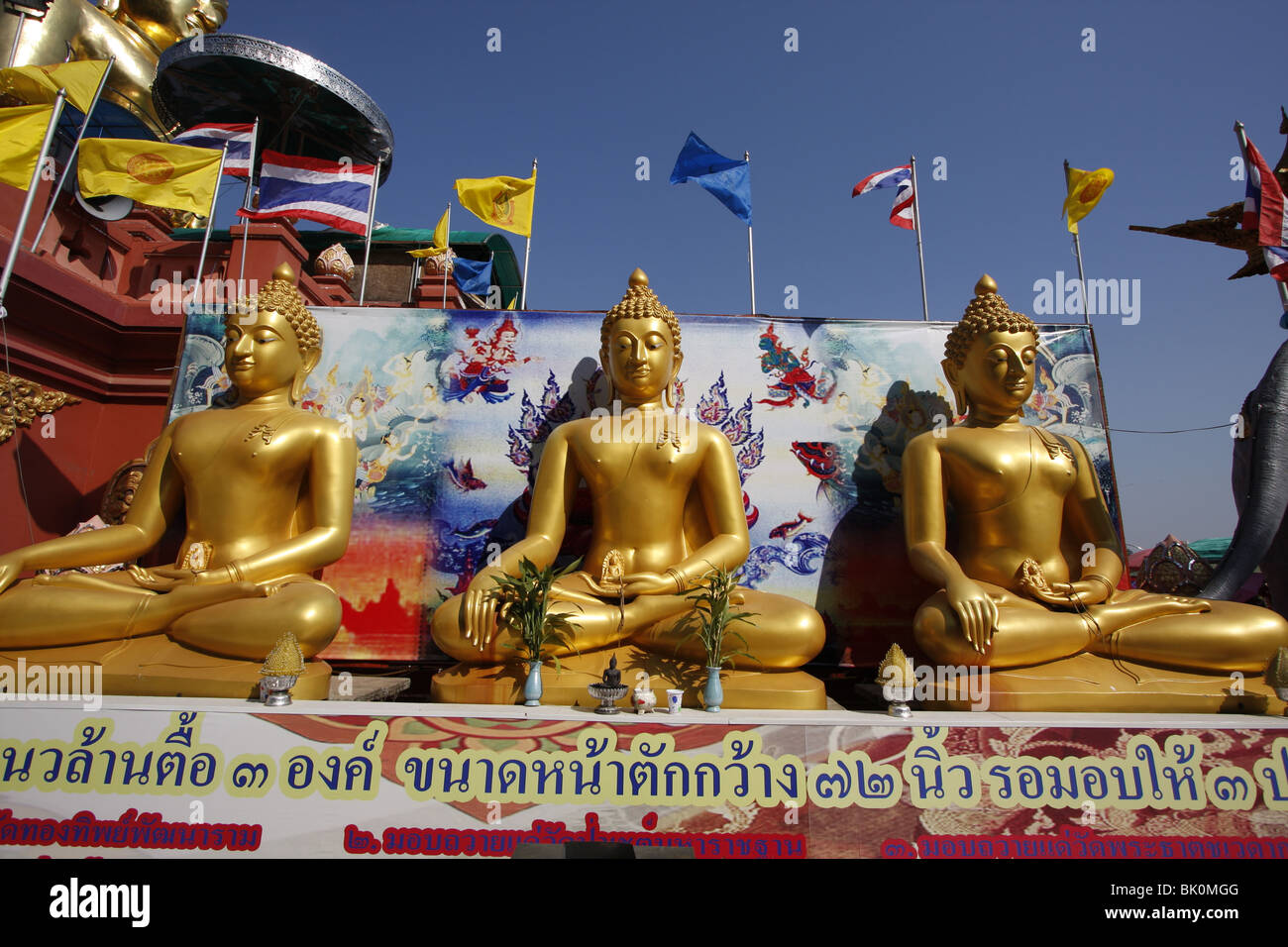 Gold Buddhas at Sop Ruak, The Golden Triangle, by the Mekong in Northern Thailand Stock Photo
