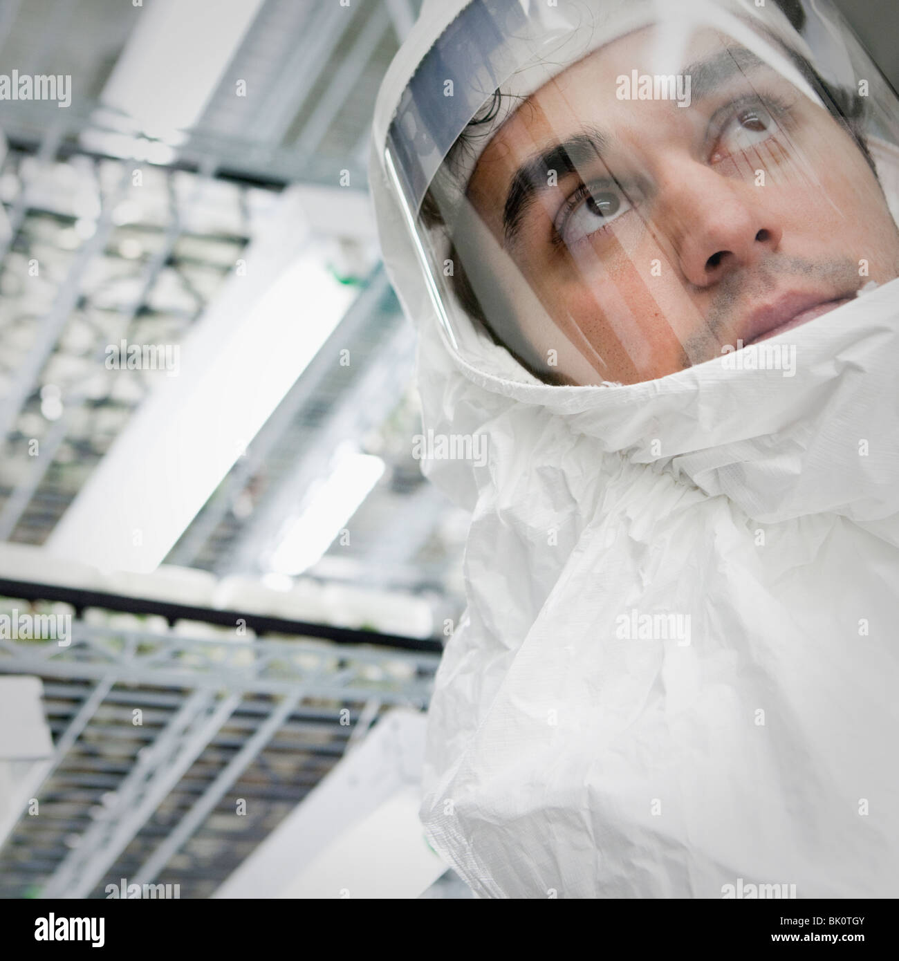 Middle Eastern scientist in clean suit in laboratory Stock Photo Alamy