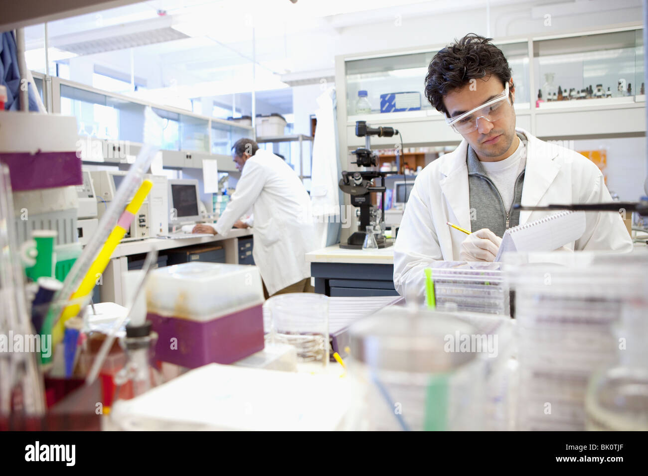 Middle Eastern scientist working in laboratory Stock Photo