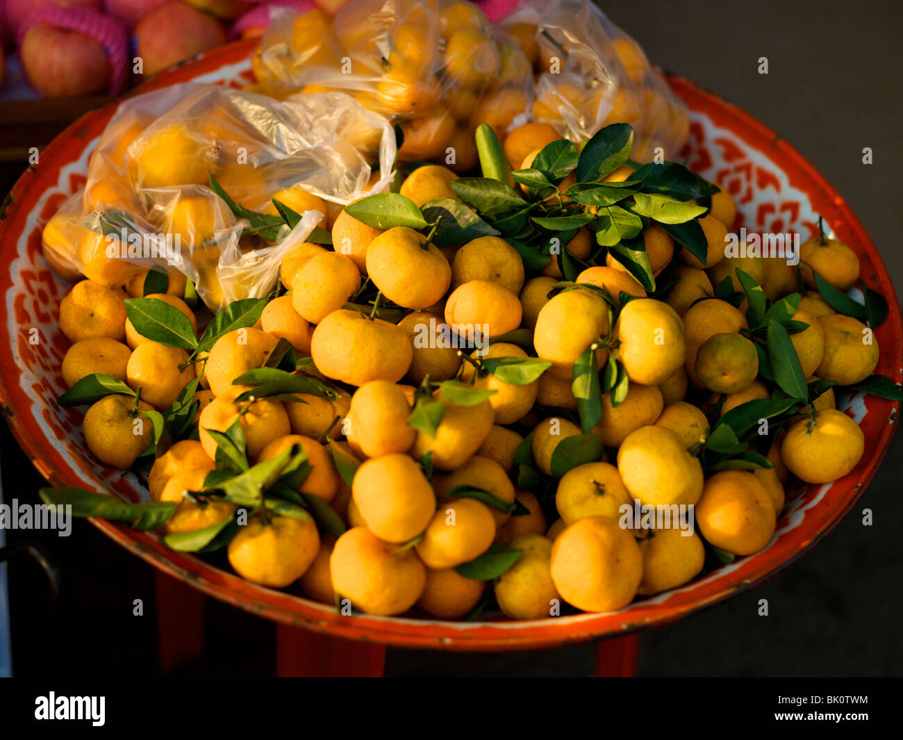 Mandarin oranges for sale in a market in thailand Stock Photo Alamy