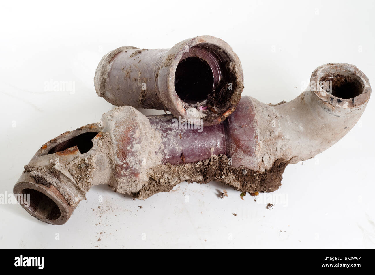 old ceramic sewage pipes taken from under house Stock Photo