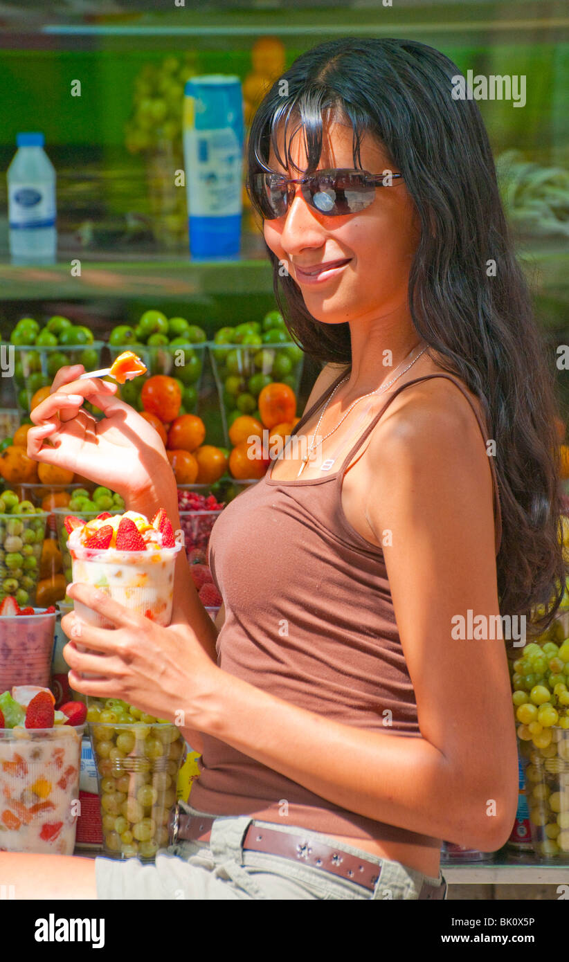 Guadalajara, Mexico, Hispanic woman enjoying fruit cup in Historic Old Town Liberation Square/Liberacion, State of Jalisco Stock Photo