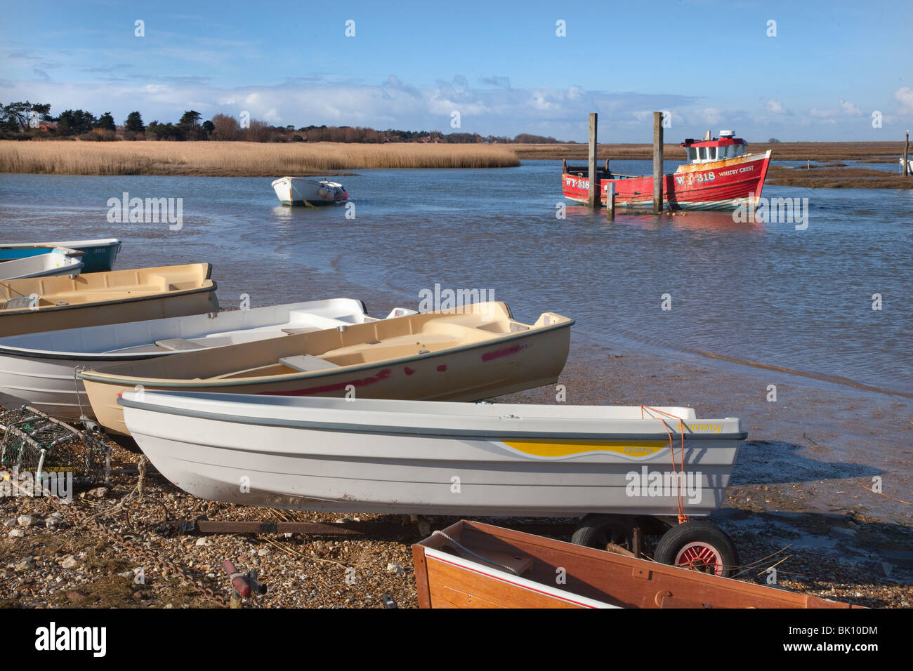 Fishing boats at Brancaster Staithe Norfolk UK March Stock Photo