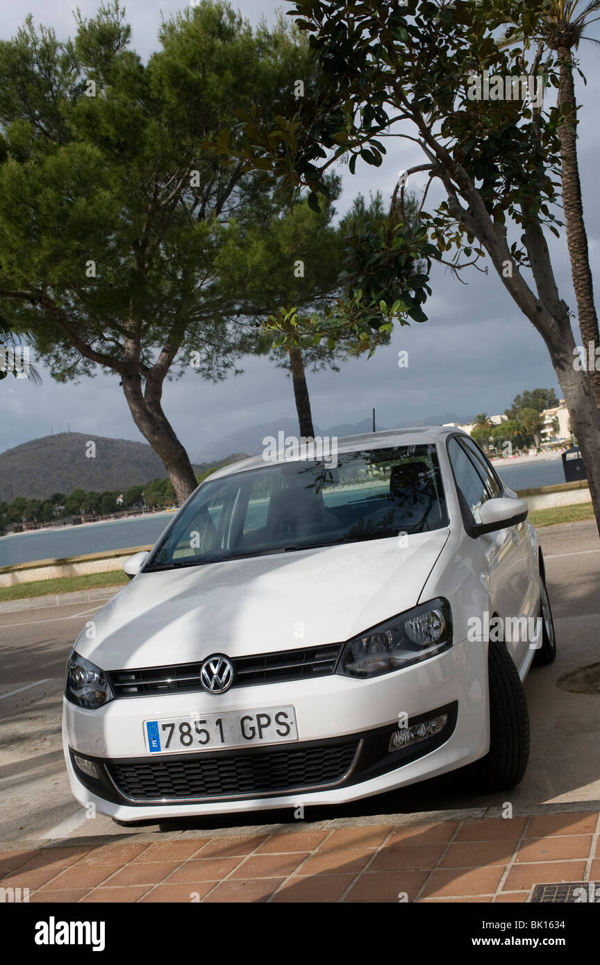 White volkswagen golf car parked in a car park in Spain Stock Photo - Alamy