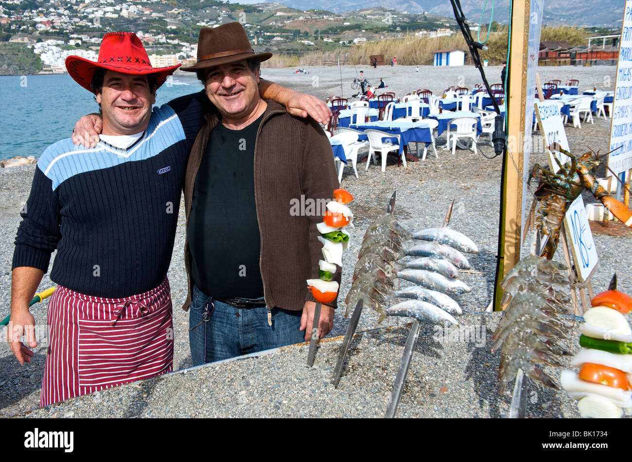 Costa del Sol, the owners of restaurant El Pinon on Solabrena beach Stock Photo
