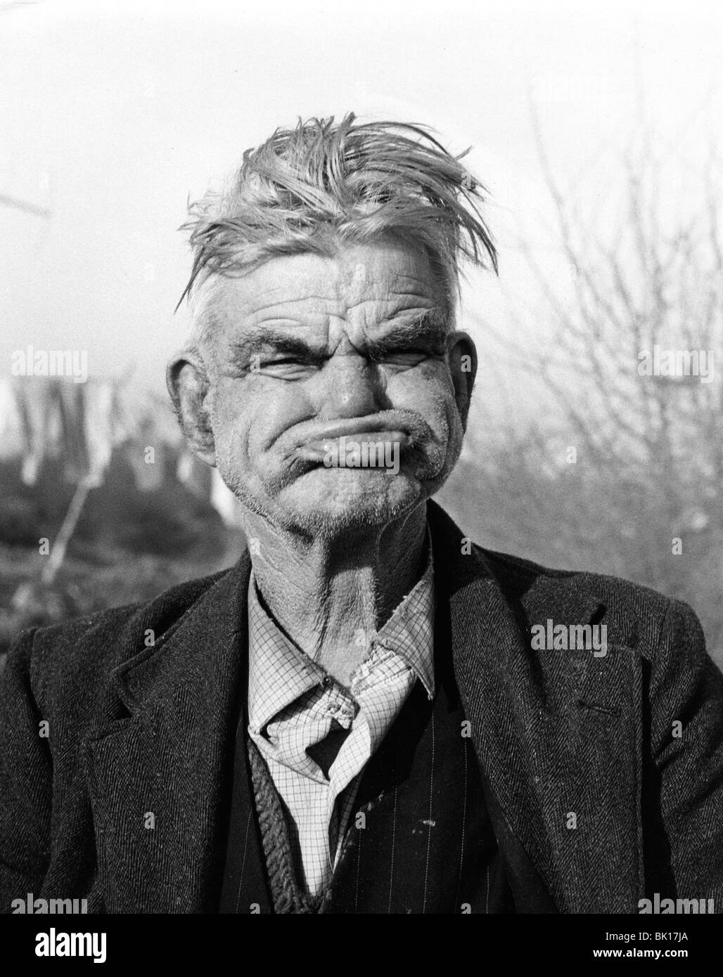 Gipsy pulling a 'gurney face', Lewes, Sussex, 1964. Stock Photo