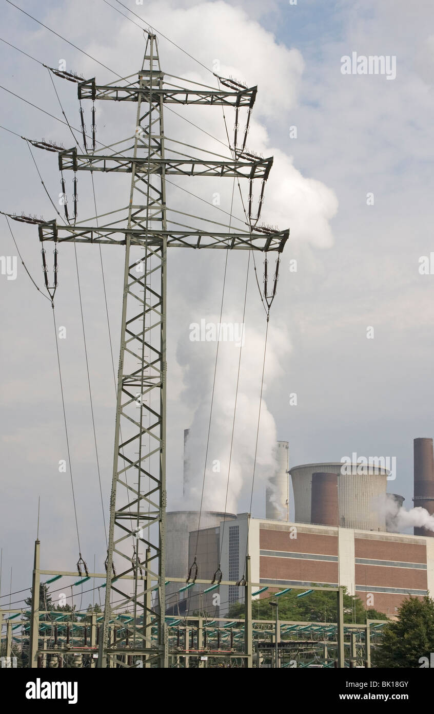 Smoking power plant with pylon Stock Photo
