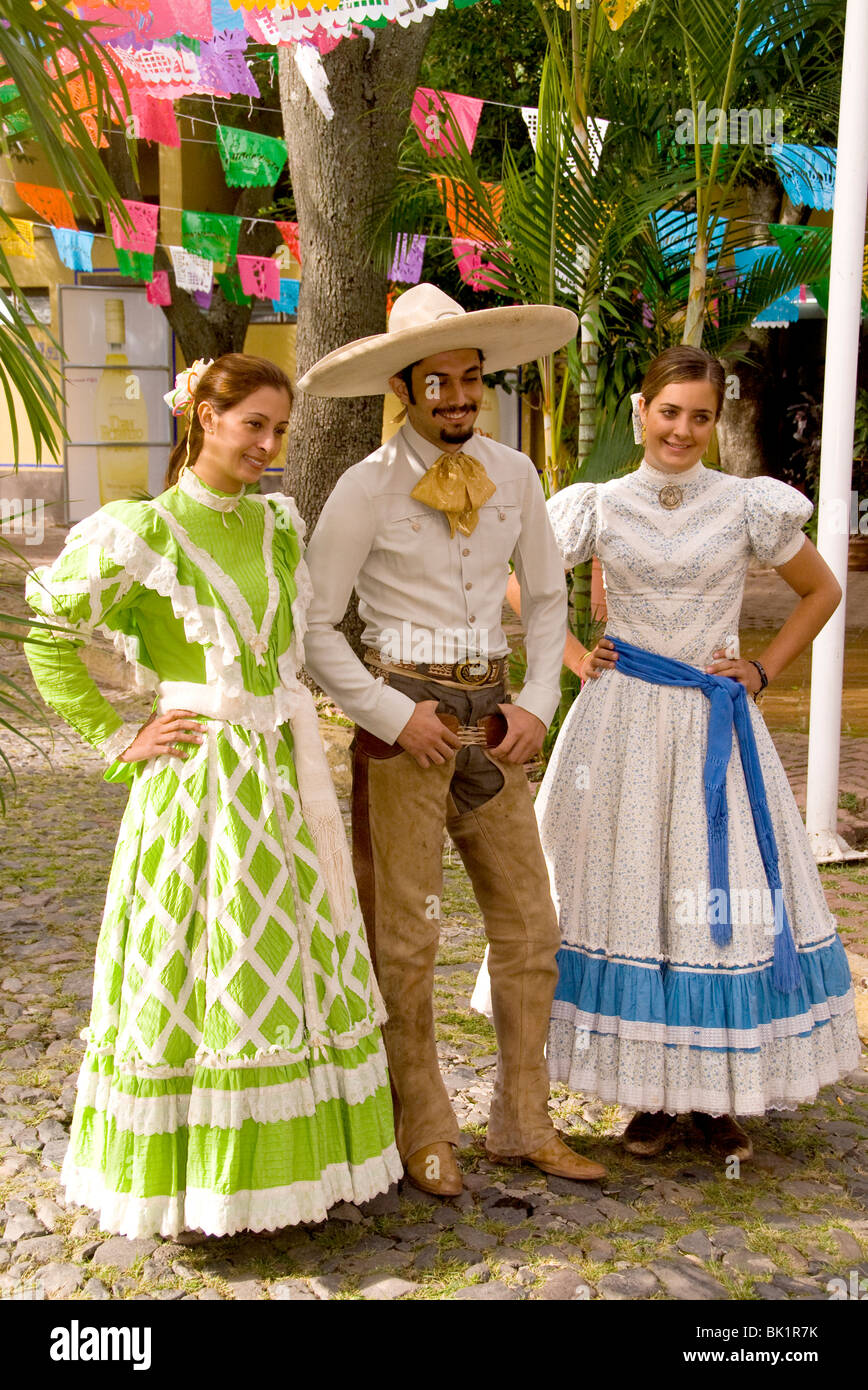 Charro (cowboy) and senoritas (girls) at Lienzo Charro, Guadalajara, Jalisco, Mexico Stock Photo
