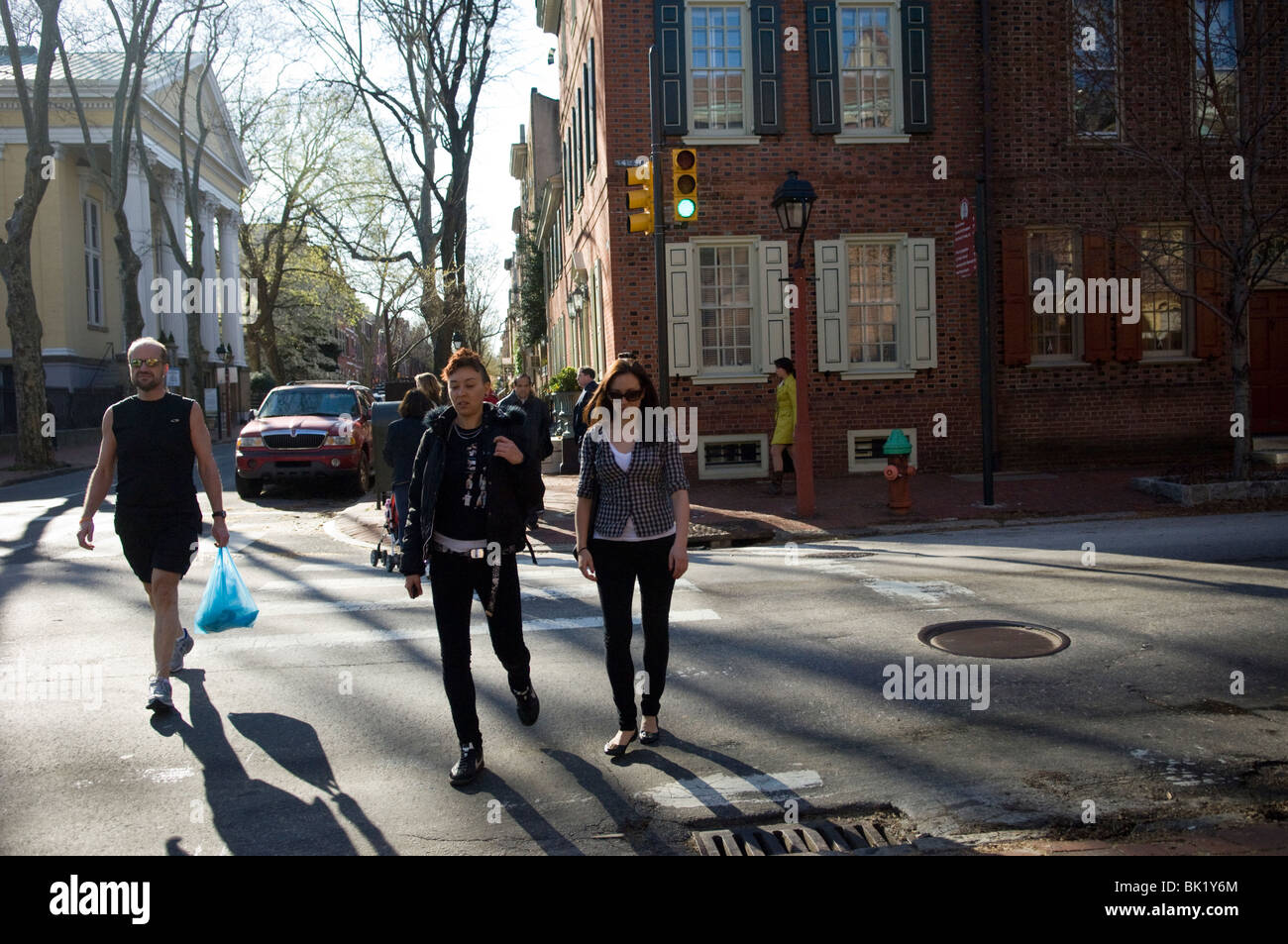 People on a street in the Society Hill neighborhood of Philadelphia, PA