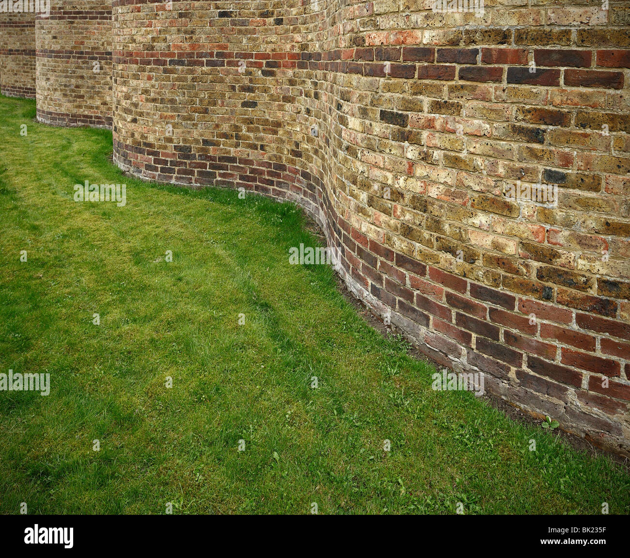 Crinkle Crankle brick wall. Stock Photo